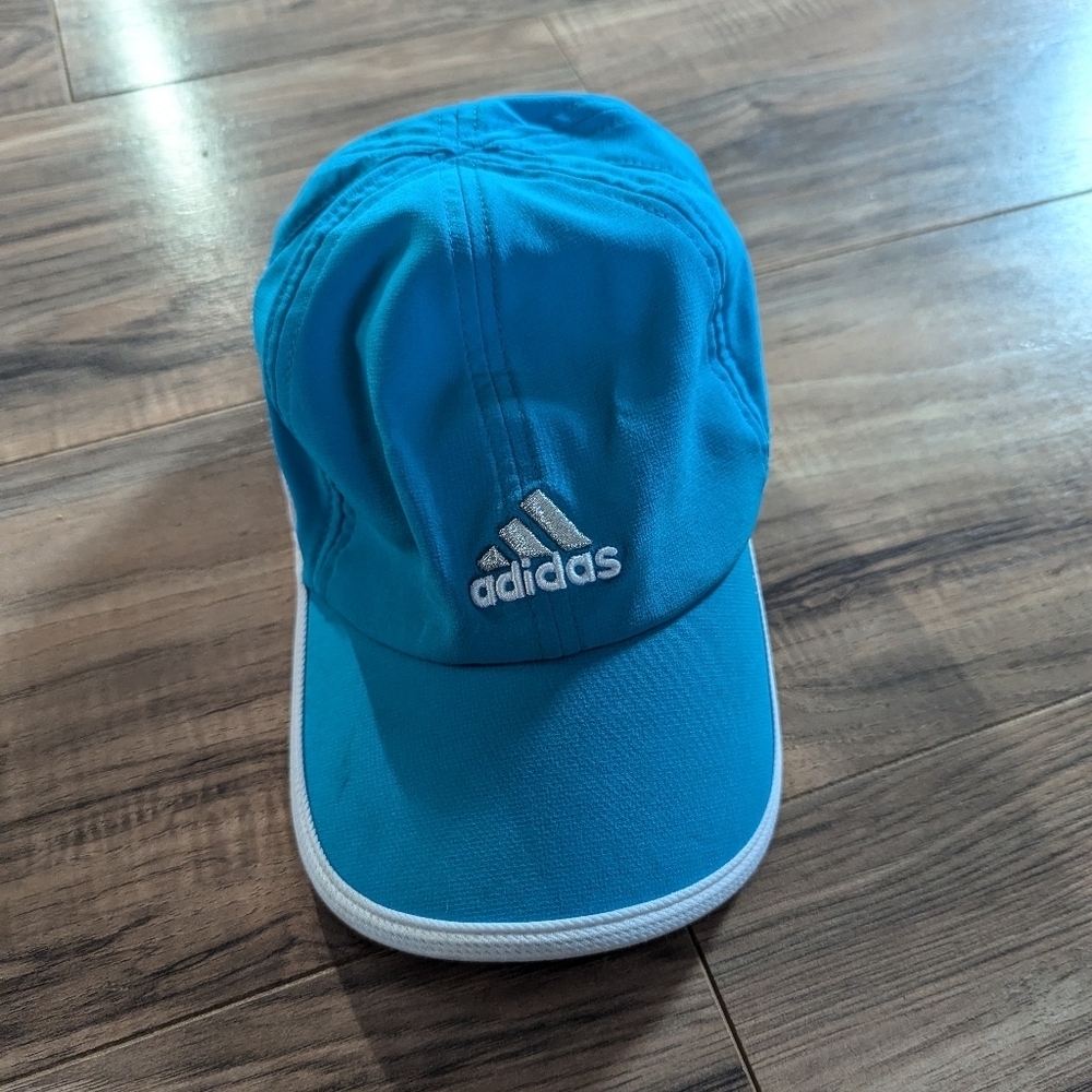 Adidas royal blue and white adjustable athletic hat. One size fits all.